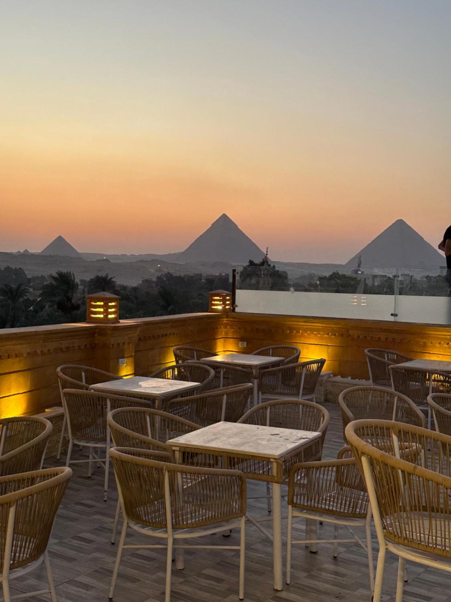 Taj Pyramids View Inn Kafret el-Gabal Екстериор снимка