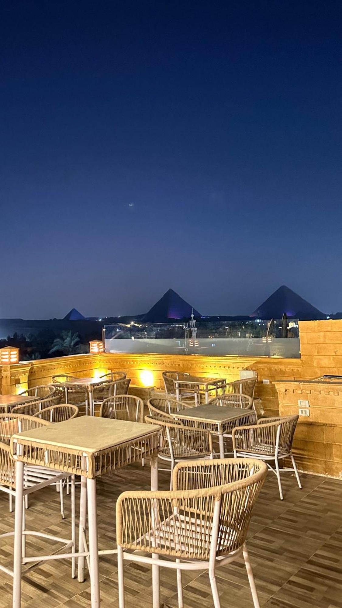 Taj Pyramids View Inn Kafret el-Gabal Екстериор снимка