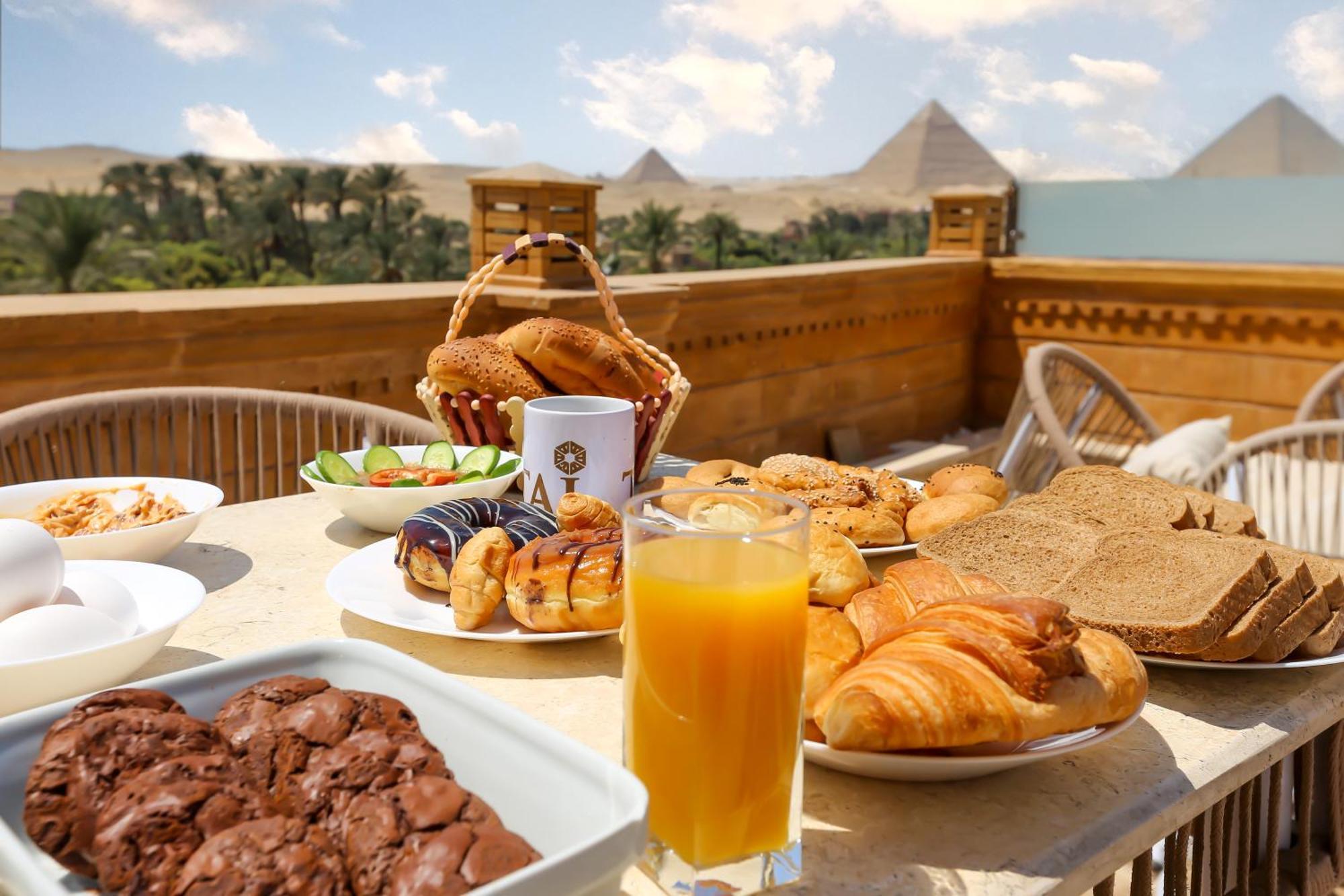 Taj Pyramids View Inn Kafret el-Gabal Екстериор снимка