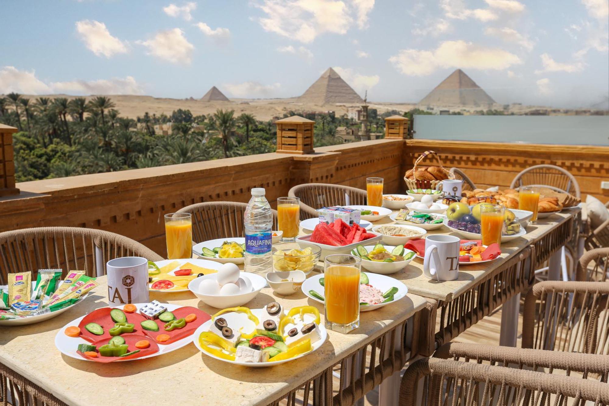 Taj Pyramids View Inn Kafret el-Gabal Екстериор снимка
