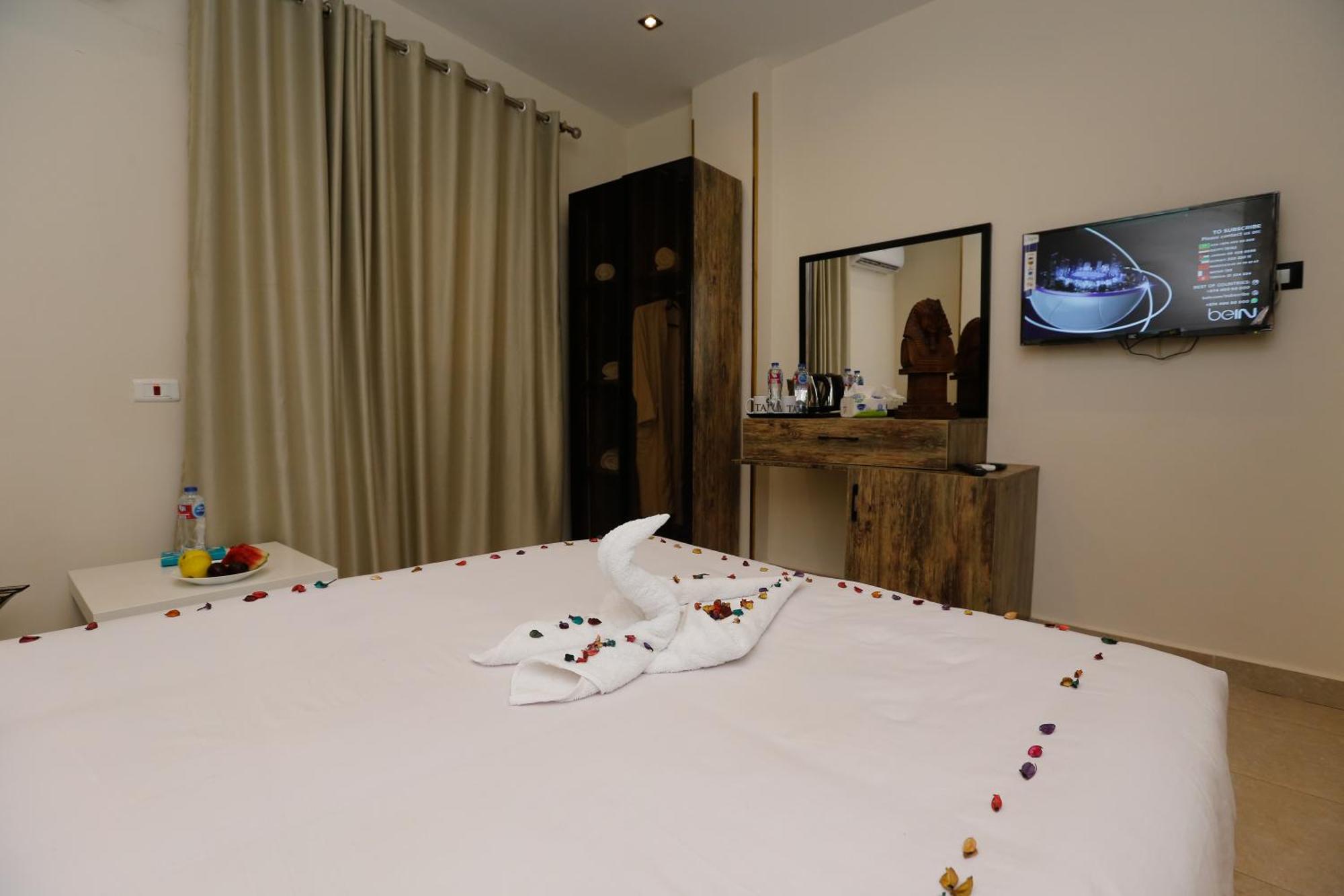 Taj Pyramids View Inn Kafret el-Gabal Екстериор снимка
