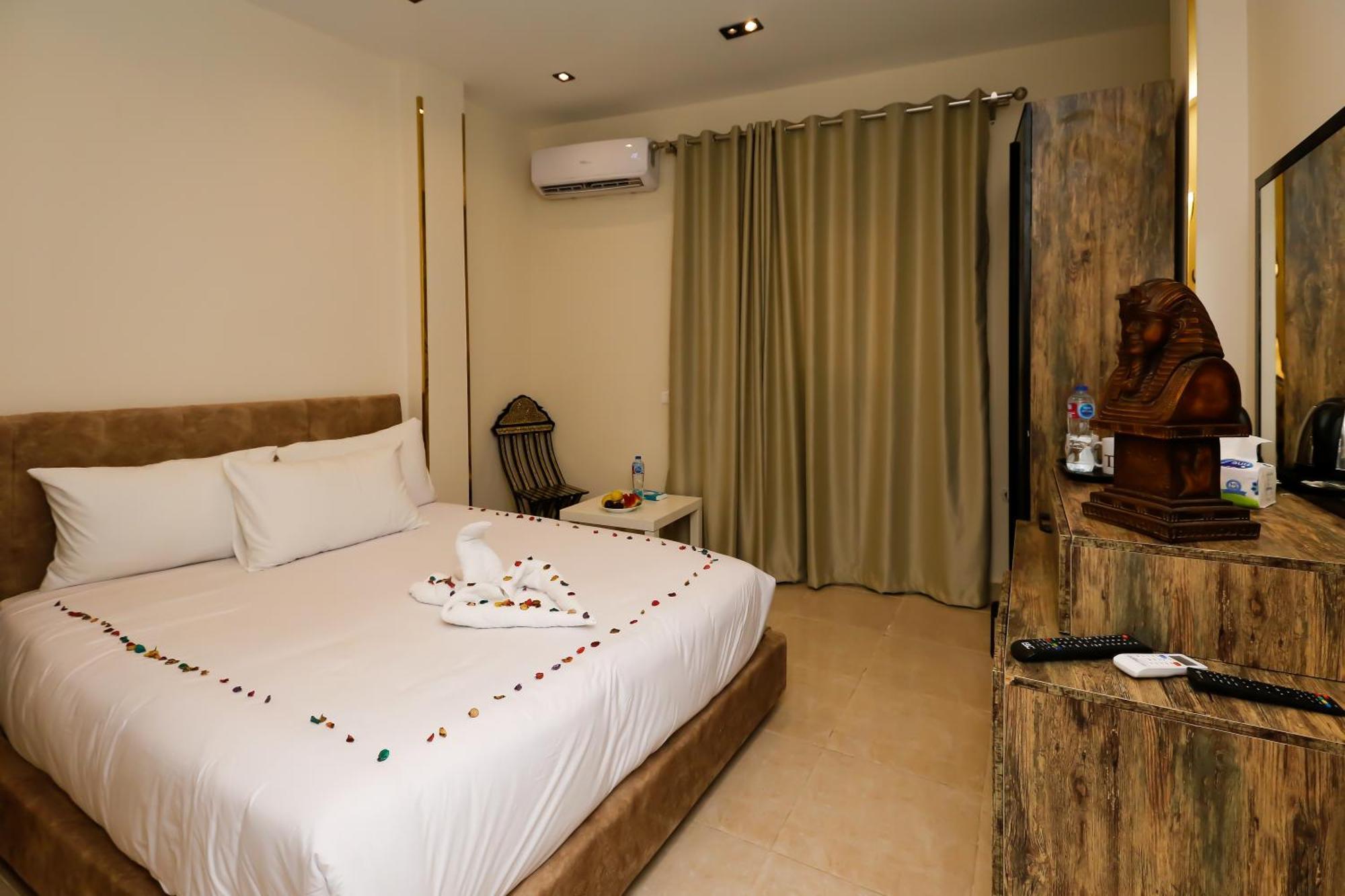Taj Pyramids View Inn Kafret el-Gabal Екстериор снимка