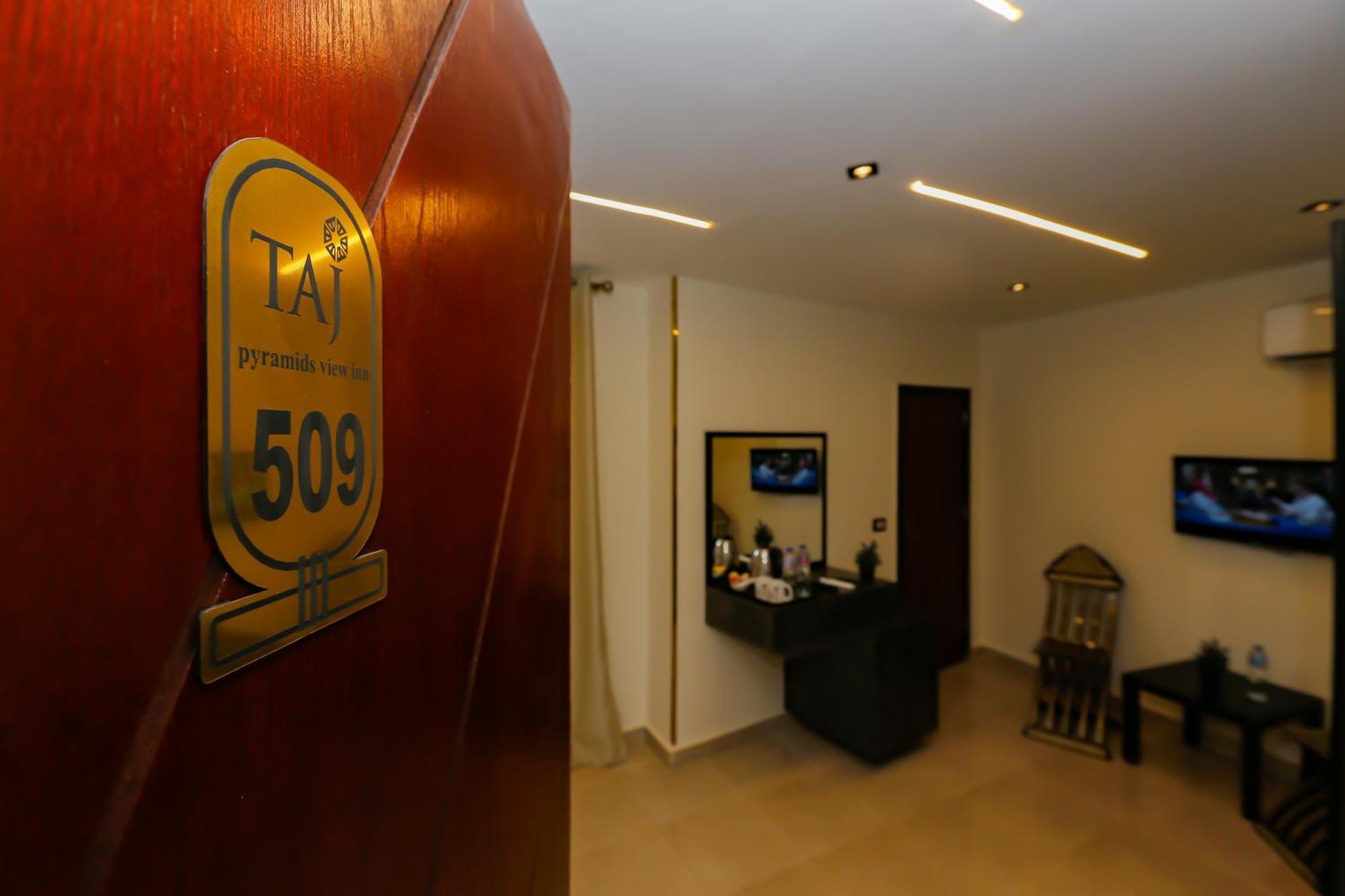 Taj Pyramids View Inn Kafret el-Gabal Екстериор снимка