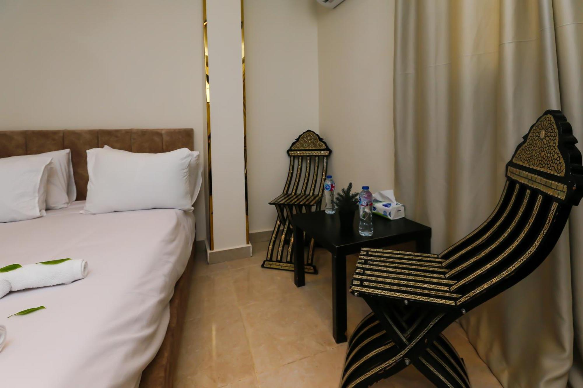 Taj Pyramids View Inn Kafret el-Gabal Екстериор снимка