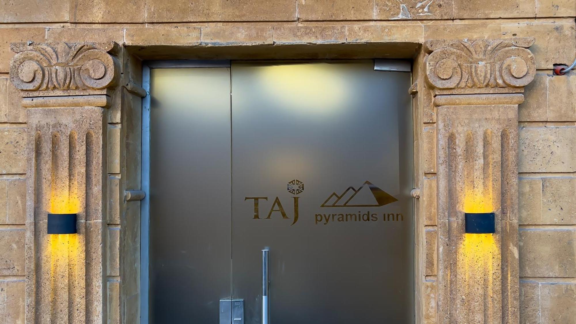 Taj Pyramids View Inn Kafret el-Gabal Екстериор снимка
